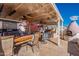 Covered patio with built-in BBQ and dining area at 9645 E Brown Rd, Mesa, AZ 85207