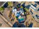 Aerial view of a house with pool and solar panels at 9645 E Brown Rd, Mesa, AZ 85207