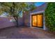 Private backyard with sliding glass door to bedroom and gravel at 9645 E Brown Rd, Mesa, AZ 85207