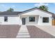 Modern home exterior with walkway at 2122 W Virginia Ave, Phoenix, AZ 85009