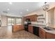 Kitchen with granite countertops and stainless steel appliances at 2818 S Olivewood --, Mesa, AZ 85212