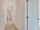 Light and airy hallway with tile floors at 8430 E Fairmount Ave, Scottsdale, AZ 85251