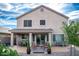 Spacious backyard patio with seating area and landscaping at 29101 N Yellow Bee Dr, San Tan Valley, AZ 85143