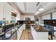 Modern kitchen featuring stainless steel appliances and white cabinetry at 9707 N 100Th St, Scottsdale, AZ 85258