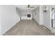 Living room with tile floor, fireplace and staircase at 1081 W 1St St # 7, Tempe, AZ 85281