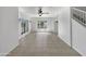Spacious living room with tile floors and ceiling fan at 1081 W 1St St # 7, Tempe, AZ 85281