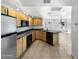 Kitchen with wood cabinets, granite countertops and stainless steel appliances at 1081 W 1St St # 7, Tempe, AZ 85281