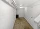 Unfinished basement with concrete floor and storage area at 1081 W 1St St # 7, Tempe, AZ 85281