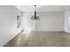 Dining room with tile flooring and chandelier at 1081 W 1St St # 7, Tempe, AZ 85281