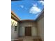 View of the front entry with double doors under a covered patio at 5937 W Coolidge St, Phoenix, AZ 85033