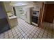 Kitchen features ample counter space and built-in appliances at 5937 W Coolidge St, Phoenix, AZ 85033