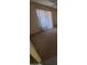 Bedroom with carpeted floor and striped curtains at 5937 W Coolidge St, Phoenix, AZ 85033