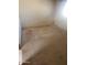 Large carpeted bedroom with window and closet at 5937 W Coolidge St, Phoenix, AZ 85033