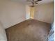 Bright living room with ceiling fan and carpeted floors at 5937 W Coolidge St, Phoenix, AZ 85033