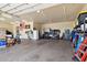 Large garage with overhead door and ample storage space at 35425 N 37Th St, Cave Creek, AZ 85331