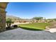 Artificial turf backyard with fire pit and mountain views at 35425 N 37Th St, Cave Creek, AZ 85331