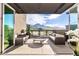Outdoor patio featuring comfortable seating and mountain views at 18720 N 101St St # 2016, Scottsdale, AZ 85255