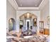 Elegant living room with hardwood floors and a view to the entryway at 7101 E Berneil Ln, Paradise Valley, AZ 85253