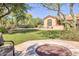 Relaxing backyard with fire pit and seating area at 7101 E Berneil Ln, Paradise Valley, AZ 85253