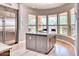 Kitchen island with granite countertop and stainless steel appliances at 7101 E Berneil Ln, Paradise Valley, AZ 85253