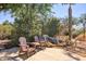 Peaceful patio with seating and a water feature at 7101 E Berneil Ln, Paradise Valley, AZ 85253