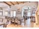 Bright dining room with seating for eight and access to the kitchen at 7101 E Berneil Ln, Paradise Valley, AZ 85253