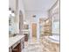 Elegant bathroom with soaking tub, walk-in shower, and double vanity at 7101 E Berneil Ln, Paradise Valley, AZ 85253