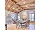 Spacious dining room featuring a large table and wood beams at 7101 E Berneil Ln, Paradise Valley, AZ 85253