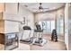 Bright home gym with floor-to-ceiling windows and exercise equipment at 7101 E Berneil Ln, Paradise Valley, AZ 85253