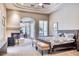 Spacious main bedroom with fireplace and access to backyard at 7101 E Berneil Ln, Paradise Valley, AZ 85253