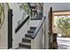 Modern staircase with gray carpeting and contemporary artwork at 4525 N 66Th St # 48, Scottsdale, AZ 85251