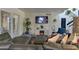Spacious living room with sectional sofa and electric fireplace at 4525 N 66Th St # 48, Scottsdale, AZ 85251