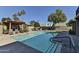 Inviting community pool with lounge chairs and a shaded seating area at 4525 N 66Th St # 48, Scottsdale, AZ 85251