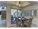 Kitchen dining area with patio access and a small table at 4525 N 66Th St # 48, Scottsdale, AZ 85251