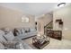Bright living room showcasing comfortable seating and a welcoming atmosphere at 7715 S 69Th Ln, Laveen, AZ 85339