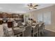 Elegant dining room with a large table and matching chairs at 7715 S 69Th Ln, Laveen, AZ 85339
