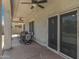 Covered patio with seating and outdoor dining area at 7715 S 69Th Ln, Laveen, AZ 85339