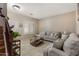 Spacious living room with tiled floors and ample natural light at 7715 S 69Th Ln, Laveen, AZ 85339