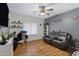 Game room with a couch, desk, and gaming setup at 7715 S 69Th Ln, Laveen, AZ 85339