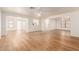 Open concept living area with wood-look floors and ceiling fans at 5036 E Roy Rogers Rd, Cave Creek, AZ 85331