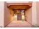 Inviting entrance with a gated courtyard and lighting at 30709 N 170Th St, Rio Verde, AZ 85263