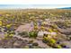 Aerial view of a large house on a spacious desert lot at 30709 N 170Th St, Rio Verde, AZ 85263