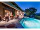 Luxury pool and spa with comfortable patio furniture at 10626 E Palo Brea Dr, Scottsdale, AZ 85262
