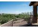 Balcony overlooking desert landscape with a curved railing at 10626 E Palo Brea Dr, Scottsdale, AZ 85262