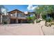 Beautiful two-story home with stone exterior at 10626 E Palo Brea Dr, Scottsdale, AZ 85262