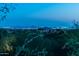 Panoramic mountain and city lights view at night at 10626 E Palo Brea Dr, Scottsdale, AZ 85262