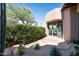 Small patio with flagstone and desert landscaping at 10626 E Palo Brea Dr, Scottsdale, AZ 85262