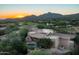 Home with flat roof, pool, and scenic mountain views at 10626 E Palo Brea Dr, Scottsdale, AZ 85262