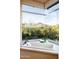 Relaxing bathtub with mountain views at 10626 E Palo Brea Dr, Scottsdale, AZ 85262