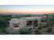Stunning property showcasing architectural details and desert landscaping at 10626 E Palo Brea Dr, Scottsdale, AZ 85262
